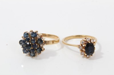 Lot 29 - Two 18ct gold sapphire cluster rings