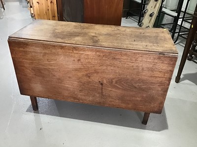 Lot 26 - George III mahogany drop leaf table on square tapered legs together with a contemporary pine desk