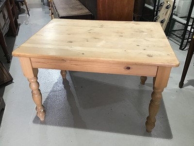 Lot 28 - Contemporary pine kitchen table on turned legs H77cm W119cm D89cm