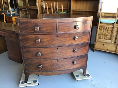 Lot 46 - George III mahogany bow front  chest of two short and three long drawers with turned handles on bracket feet H106cm W105.5cm D53cm