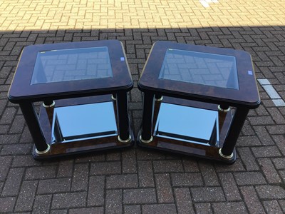 Lot 50 - Pair of contemporary walnut effect coffee table with glass inset tops and mirrored undertier H55cm W68cm D60cm