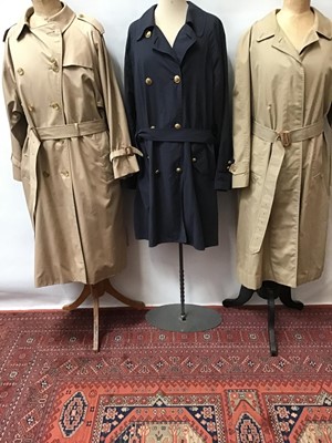 Lot 1818 - Ladies Burberrys' trench coat size petite 18, Burberrys Scotch House Navy trench size 14 regular, Aquascutum trench size 18 and black wool and cashmere cape. Plus a Norwegian sheep skin 3/4 coat an...