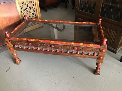Lot 37 - 20th century Pakistani coffee/display table with carved, turned and painted decoration H56.5cm W123cm D60.5cm