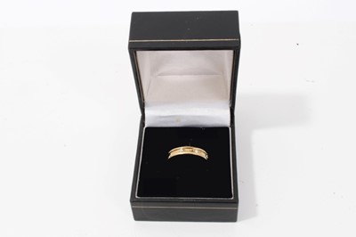 Lot 102 - 9ct gold ring set with three diamonds