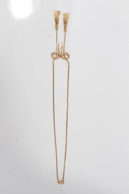 Lot 120 - 9ct gold necklace with loop and tassel decoration