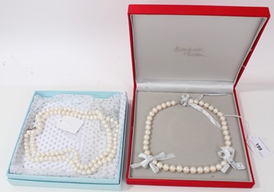 Lot 199 - Two cultured pearl necklaces, both with silver clasps