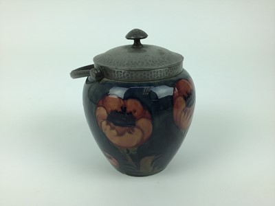 Lot 18 - Moorcroft pewter mounted biscuit barrel decorated in the poppy pattern on blue and green ground