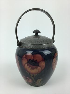 Lot 18 - Moorcroft pewter mounted biscuit barrel decorated in the poppy pattern on blue and green ground