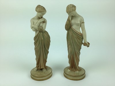 Lot 22 - Pair of Royal Worcester Blush ivory semi clad female figures