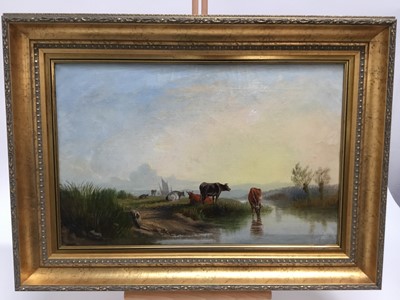 Lot 72 - English School, late 19th century, oil on canvas, A river landscape with cattle watering in the foreground, a sailing vessel beyond, in gilt frame