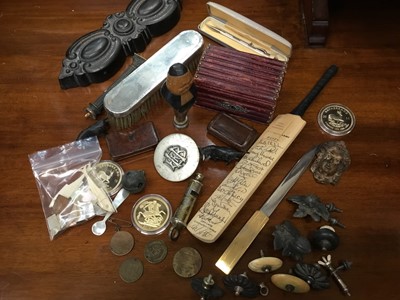 Lot 270 - Box of assorted items to include 19th century leather covered jewellery box, wooden snuff boxes, carved wooden seal, Regency and other teapot knops, miniature signed Essex cricket bat, copies of co...