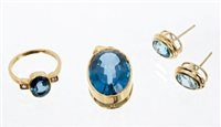 Lot 686 - Blue topaz pendant with a large oval mixed cut...
