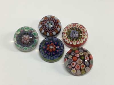 Lot 287 - Five miniature Strathearn millefiori paperweights, approximately 4cm diameter