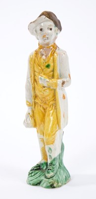 Lot 49 - Prattware figure of a young man, c.1800