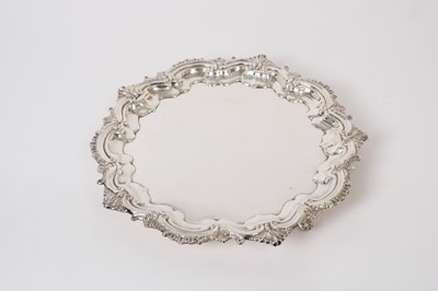 Lot 207 - Good Quality Contemporary silver salver with scroll border, raised on three scroll feet, (Birmingham 1964), Maker, Roberts & Dore, 29oz, 31cm in diameter