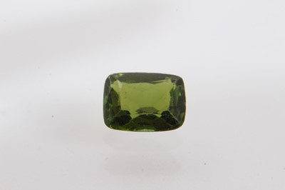 Lot 92 - Unmounted rectangular cushion-cut green tourmaline measuring approximately 9.40mm x 7.30mm x 4.30mm