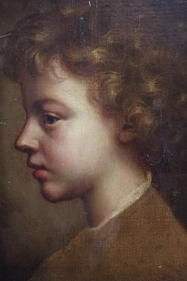 Lot 454 - 18th century, Italian School, oil on canvas - portrait of a young boy in profile, in ornate parcel gilt carved Florentine frame