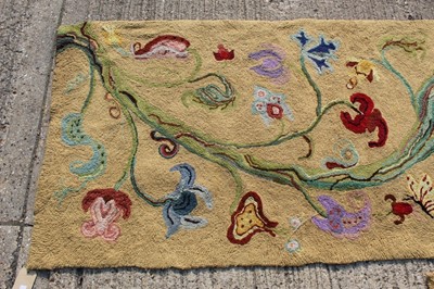 Lot 1390 - Two yellow ground embroidered rugs