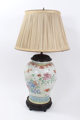 Lot 161 - Large 18th/19th century Chinese famille rose porcelain baluster jar, painted with peonies and other flowers, converted to a vase with fine quality carved hardwood stand and lid, the jar measuring 3...