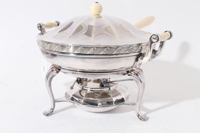 Lot 147 - Early 20th century American silver plated warming dish with ivory handle, push fit cover with ivory ball finial, two handled water container, on stand with integral burner