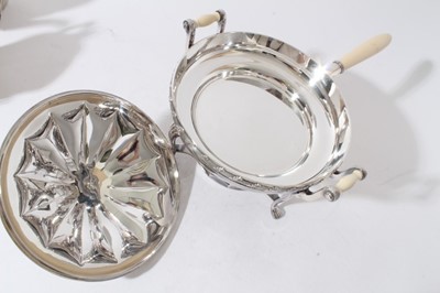 Lot 147 - Early 20th century American silver plated warming dish with ivory handle, push fit cover with ivory ball finial, two handled water container, on stand with integral burner
