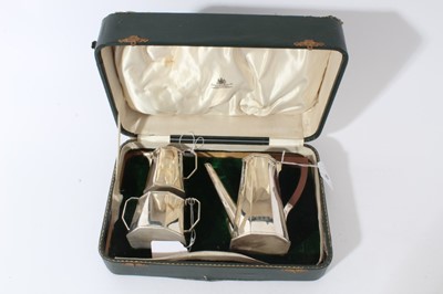 Lot 89 - George V Art Deco silver bachelors coffee set comprising coffee pot of tapered octagonal form, with angular spout, hinged cover and angular bakelite handle