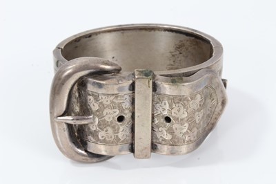 Lot 19 - Victorian silver hinged bangle with buckle design