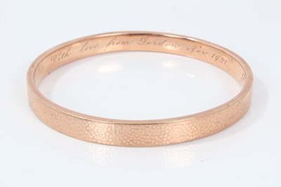 Lot 26 - 1920s rose gold bangle with hammered finish, Birmingham 1921