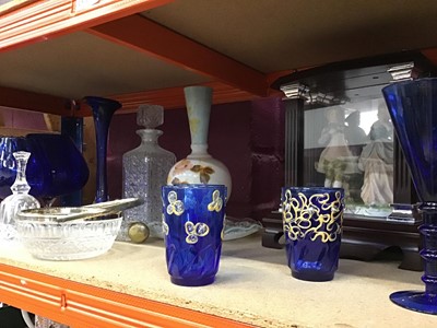 Lot 532 - Selection of Colbolt blue glass ware and other glass with display cabinet and two enclosed china figurienes