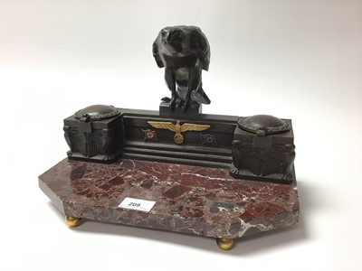 Lot 209 - Nazi Kreigsmarine bronze and marble desk stand, with central bronze Eagle on raised back set with Nazi badges above two inkwells, one shaped marble base raised on ball feet, 34cm in length