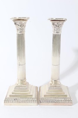 Lot 25 - Pair of George V silver Corinthian column candlesticks (London 1914), maker Goldsmiths & Silversmiths Company