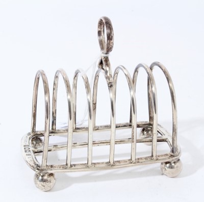 Lot 34 - George V silver toast rack with six divisions (London 1913), 6.6ozs