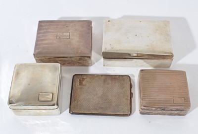 Lot 104 - George V silver cigarette box of rectangular form with domed hinged cover, (London 1920), together with another of square form (Birmingham 1927)