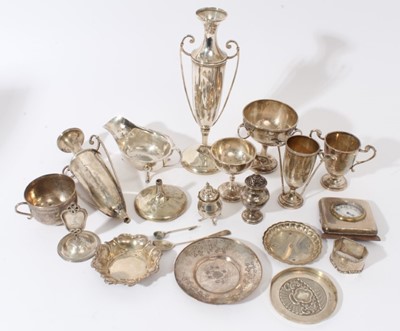 Lot 105 - Contemporary silver sauce boat of helmet form (Sheffield 1962), maker Viners, together with four silver Golf trophies cups