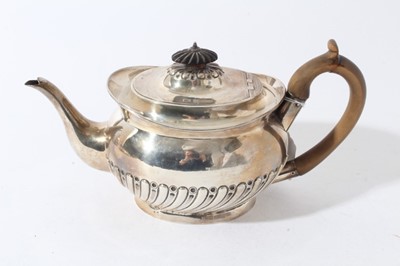 Lot 42 - Victorian silver teapot of oval half reeded form with fruitwood knop and handle and engraved crest (London 1892), all at 20ozs