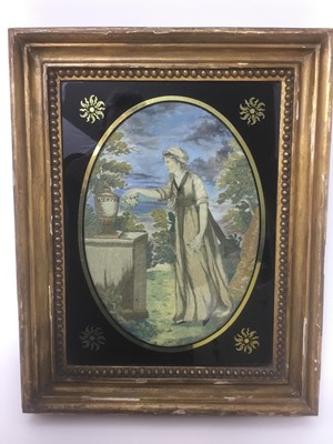 Lot 43 - Georgian oval silkwork panel - classical lady in landscape, in verre eglomise gilt frame
