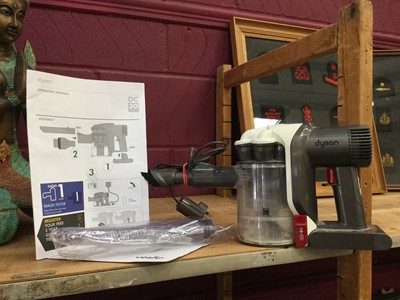 Lot 10 - Dyson DC30 hand held vacuum cleaner together with manuals and accessories