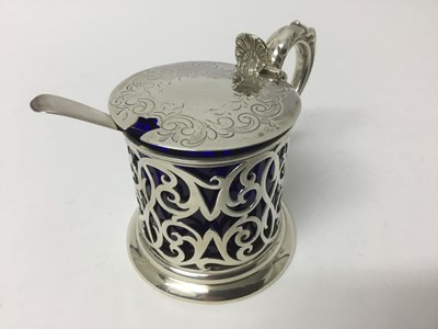 Lot 274 - Victorian silver mustard with blue glass liner