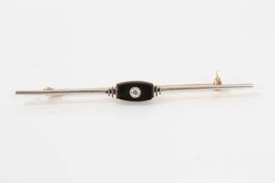 Lot 193 - Art Deco diamond and black onyx bar brooch 'Friday Street, 28th June, 1927'