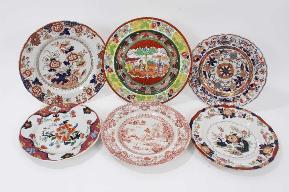 Lot 77 - A Masons Ironstone plate, in famille verte style, and five other Ironstone plates