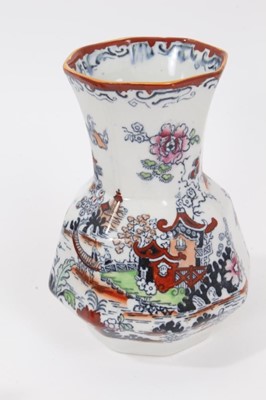 Lot 68 - A rare Masons Ironstone relief moulded jug, five other Masons jugs and two tooth brush vases