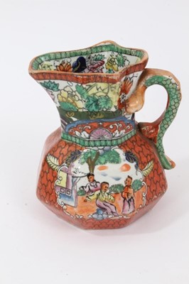 Lot 68 - A rare Masons Ironstone relief moulded jug, five other Masons jugs and two tooth brush vases