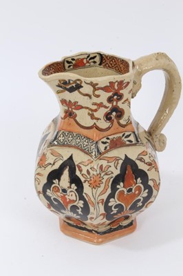 Lot 68 - A rare Masons Ironstone relief moulded jug, five other Masons jugs and two tooth brush vases