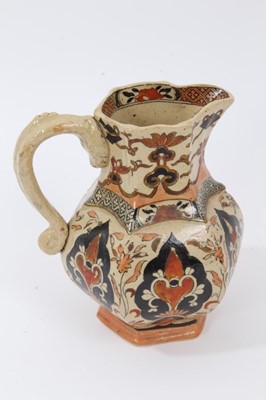 Lot 68 - A rare Masons Ironstone relief moulded jug, five other Masons jugs and two tooth brush vases