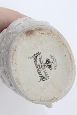 Lot 68 - A rare Masons Ironstone relief moulded jug, five other Masons jugs and two tooth brush vases