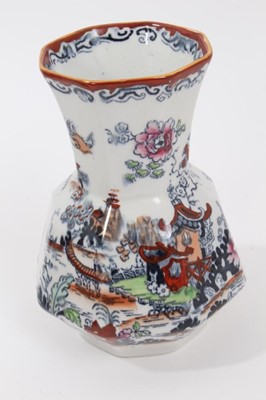 Lot 68 - A rare Masons Ironstone relief moulded jug, five other Masons jugs and two tooth brush vases