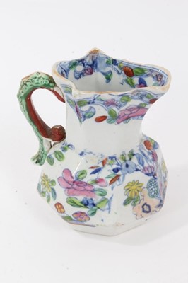 Lot 68 - A rare Masons Ironstone relief moulded jug, five other Masons jugs and two tooth brush vases
