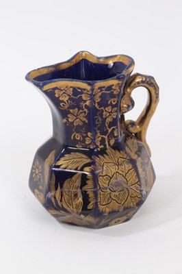 Lot 68 - A rare Masons Ironstone relief moulded jug, five other Masons jugs and two tooth brush vases