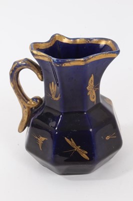 Lot 68 - A rare Masons Ironstone relief moulded jug, five other Masons jugs and two tooth brush vases