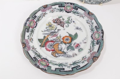 Lot 82 - Two Masons Ironstone plates, in Chinese famille rose style, and four other plates and a sauce tureen stand